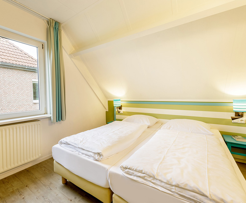 urlaub-mit-hund-center-parcs-nordseekueste-deutschland-comfort-4-personen-schlafzimmer