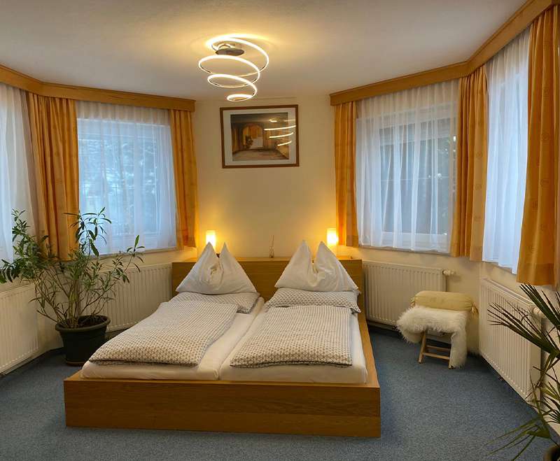 urlaub-mit-hund-hotel-residenz-gruber-salzburger-land-junior-suite-schlafbereich